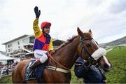 16 March 2018; Richard Johnson celebrates after winning the Timico Cheltenham Gold Cup Steeple Chase on Native River on Day Four of the Cheltenham Racing Festival at Prestbury Park in Cheltenham, England. Photo by Ramsey Cardy/Sportsfile