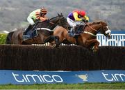 16 March 2018; Native River, with Richard Johnson up, right, jump the last ahead of Might Bite, with Nico de Boinville up, on their way to winning The Timico Cheltenham Gold Cup Steeple Chase on Day Four of the Cheltenham Racing Festival at Prestbury Park in Cheltenham, England. Photo by Seb Daly/Sportsfile