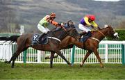 16 March 2018; Native River, with Richard Johnson up, right, races clear of Might Bite, with Nico de Boinville up, on their way to winning the Timico Cheltenham Gold Cup Steeple Chase on Day Four of the Cheltenham Racing Festival at Prestbury Park in Cheltenham, England. Photo by Seb Daly/Sportsfile