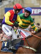16 March 2018; Jockey Richard Johnson, left, is congratulated by Barry Geraghty after winning the Timico Cheltenham Gold Cup Steeple Chase on Native River during Day Four of the Cheltenham Racing Festival at Prestbury Park in Cheltenham, England. Photo by Ramsey Cardy/Sportsfile