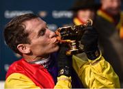 16 March 2018; Jockey Richard Johnson celebrates with the Gold Cup after winning the Timico Cheltenham Gold Cup Steeple Chase on Native River on Day Four of the Cheltenham Racing Festival at Prestbury Park in Cheltenham, England. Photo by Seb Daly/Sportsfile