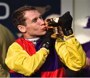 16 March 2018; Jockey Richard Johnson celebrates with the Gold Cup after winning the Timico Cheltenham Gold Cup Steeple Chase on Native River on Day Four of the Cheltenham Racing Festival at Prestbury Park in Cheltenham, England. Photo by Seb Daly/Sportsfile