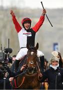 16 March 2018; Jockey Harriet Tucker celebrates as she enters the winners' enclosure after winning the St. James’s Place Foxhunter Steeple Chase Challenge Cup on Pacha Du Polder on Day Four of the Cheltenham Racing Festival at Prestbury Park in Cheltenham, England. Photo by Seb Daly/Sportsfile