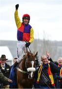 16 March 2018; Jockey Richard Johnson celebrates as he enters the winners' enclosure after winning the Timico Cheltenham Gold Cup Steeple Chase on Native River on Day Four of the Cheltenham Racing Festival at Prestbury Park in Cheltenham, England. Photo by Seb Daly/Sportsfile