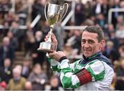 16 March 2018; Leading jockey of the 2018 Cheltenham Festival Davy Russell celebrates with the cup during Day Four of the Cheltenham Racing Festival at Prestbury Park in Cheltenham, England. Photo by Seb Daly/Sportsfile