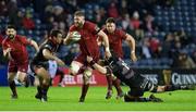 16 March 2018;  Darren O'Shea of Munster is tackled by Lewis Carmichael, left, and John Hardie of Edinburgh during the Guinness PRO14 Round 17 match between Edinburgh and Munster at the BT Murrayfield Stadium in Edinburgh, Scotland. Photo by Kenny Smith/Sportsfile