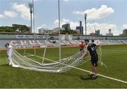 17 March 2018; Members of Thailand GAA put up the goalnets before the 2016 All-Stars v 2017 All-Stars Exhibition match during the TG4 Ladies Football All-Star Tour 2018. Chulalongkorn University Football Club Stadium, Bangkok, Thailand. Photo by Piaras Ó Mídheach/Sportsfile