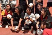 17 March 2018; Local children during a LGFA coaching session before the 2016 All-Stars v 2017 All-Stars Exhibition match on the TG4 Ladies Football All-Star Tour 2018. Chulalongkorn University Football Club Stadium, Bangkok, Thailand. Photo by Piaras Ó Mídheach/Sportsfile