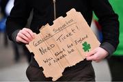 17 March 2018; A Ireland supporter holds a sign looking for a ticket prior to the NatWest Six Nations Rugby Championship match between England and Ireland at Twickenham Stadium in London, England. Photo by Ramsey Cardy/Sportsfile