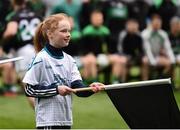 17 March 2018: AIB flagbearer Grace Bowler, age 11, welcomes the Nemo Rangers team to the pitch prior to the AIB GAA Football All-Ireland Senior Club Championship Final match between Corofin and Nemo Rangers at Croke Park in Dublin. Photo by Stephen McCarthy/Sportsfile