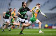 17 March 2018: Micheál Lundy of Corofin in action against Kevin Fulignati of Nemo Rangers during the AIB GAA Football All-Ireland Senior Club Championship Final match between Corofin and Nemo Rangers at Croke Park in Dublin. Photo by Stephen McCarthy/Sportsfile