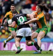 17 March 2018: Barry O'Driscoll of Nemo Rangers is tackled by Kieran Molloy of Corofin during the AIB GAA Football All-Ireland Senior Club Championship Final match between Corofin and Nemo Rangers at Croke Park in Dublin. Photo by David Fitzgerald/Sportsfile