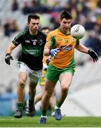 17 March 2018: Martin Farragher of Corofin in action against Stephen Cronin of Nemo Rangers during the AIB GAA Football All-Ireland Senior Club Championship Final match between Corofin and Nemo Rangers at Croke Park in Dublin. Photo by David Fitzgerald/Sportsfile