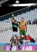 17 March 2018: Ronan Steede of Corofin in action against Alan O'Donovan of Nemo Rangers during the AIB GAA Football All-Ireland Senior Club Championship Final match between Corofin and Nemo Rangers at Croke Park in Dublin. Photo by David Fitzgerald/Sportsfile