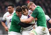 17 March 2018; Elliot Daly of England is tackled by Jacob Stockdale, left, and Dan Leavy of Ireland during the NatWest Six Nations Rugby Championship match between England and Ireland at Twickenham Stadium in London, England. Photo by Ramsey Cardy/Sportsfile
