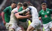 17 March 2018; Jacob Stockdale of Ireland is tackled by George Kruis, left, and Jonny May of England during the NatWest Six Nations Rugby Championship match between England and Ireland at Twickenham Stadium in London, England. Photo by Brendan Moran/Sportsfile