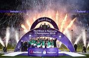 17 March 2018; The Ireland team celebrate with the Six Nations and Triple Crown trophies after the NatWest Six Nations Rugby Championship match between England and Ireland at Twickenham Stadium in London, England. Photo by Ramsey Cardy/Sportsfile