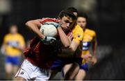 17 March 2018: Mark Collins of Cork in action against Cathal O'Connor of Clare during the Allianz Football League Division 2 Round 6 match between Cork and Clare at Páirc Uí Rinn in Cork. Photo by Matt Browne/Sportsfile