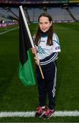 17 March 2018: AIB flagbearer Mia O'Callaghan, age 9, who won an AIB flag bearer competition to wave on Nemo Rangers sat the AIB Senior Football Club Championship Final between Corofin and Nemo Rangers at Croke Park on St. Patrick's Day. For exclusive content and behind the scenes action of the AIB GAA & Camogie Club Championships follow AIB GAA on Facebook, Twitter, Instagram and Snapchat and www.aib.ie/gaa. Photo by Stephen McCarthy/Sportsfile