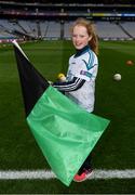 17 March 2018: AIB flagbearer Grace Bowler, age 11, who won an AIB flag bearer competition to wave on Nemo Rangers sat the AIB Senior Football Club Championship Final between Corofin and Nemo Rangers at Croke Park on St. Patrick's Day. For exclusive content and behind the scenes action of the AIB GAA & Camogie Club Championships follow AIB GAA on Facebook, Twitter, Instagram and Snapchat and www.aib.ie/gaa. Photo by Stephen McCarthy/Sportsfile