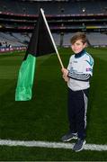 17 March 2018: AIB flagbearer David Callanan, age 10, who won an AIB flag bearer competition to wave on Nemo Rangers sat the AIB Senior Football Club Championship Final between Corofin and Nemo Rangers at Croke Park on St. Patrick's Day. For exclusive content and behind the scenes action of the AIB GAA & Camogie Club Championships follow AIB GAA on Facebook, Twitter, Instagram and Snapchat and www.aib.ie/gaa. Photo by Stephen McCarthy/Sportsfile