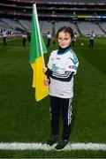 17 March 2018: AIB flagbearer Leanne Kate Costello, age 10, who won an AIB flag bearer competition to wave on Corofin sat the AIB Senior Football Club Championship Final between Corofin and Nemo Rangers at Croke Park on St. Patrick's Day. For exclusive content and behind the scenes action of the AIB GAA & Camogie Club Championships follow AIB GAA on Facebook, Twitter, Instagram and Snapchat and www.aib.ie/gaa. Photo by Stephen McCarthy/Sportsfile