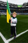 17 March 2018: AIB flagbearer Evan O'Sullivan, age 8, who won an AIB flag bearer competition to wave on Corofin sat the AIB Senior Football Club Championship Final between Corofin and Nemo Rangers at Croke Park on St. Patrick's Day. For exclusive content and behind the scenes action of the AIB GAA & Camogie Club Championships follow AIB GAA on Facebook, Twitter, Instagram and Snapchat and www.aib.ie/gaa. Photo by Stephen McCarthy/Sportsfile