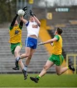 18 March 2018; Niall Kearns of Monaghan in action against Conor Morrison, left, and Hugh McFadden of Donegal during the Allianz Football League Division 1 Round 6 match between Monaghan and Donegal at St. Tiernach's Park in Clones, Monaghan. Photo by Oliver McVeigh/Sportsfile
