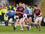 18 March 2018; Damien Comer of Galway makes a break from Emmet O'Conghaile, left, and James McCarthy of Dublin during the Allianz Football League Division 1 Round 6 match between Galway and Dublin at Pearse Stadium, in Galway. Photo by Ray Ryan/Sportsfile