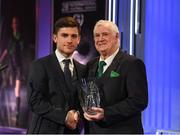18 March 2018; Aaron Bolger is presented with the Under 17 International Player of the Year award by FAI President Tony Fitzgerald during the 3 FAI International Awards at RTE Studios in Donnybrook, Dublin. Photo by Stephen McCarthy/Sportsfile