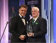 18 March 2018; Aidan Roche is presented with the Intermediate Player of the Year award by FAI President Tony Fitzgerald during the 3 FAI International Awards at RTE Studios in Donnybrook, Dublin. Photo by Stephen McCarthy/Sportsfile