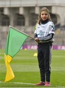 17 March 2018: AIB flagbearer Amy Jordan, age 10, who won an AIB flag bearer competition to wave on Nemo Rangers at the AIB Senior Football Club Championship Final between Corofin and Nemo Rangers at Croke Park on St. Patrick's Day. For exclusive content and behind the scenes action of the AIB GAA & Camogie Club Championships follow AIB GAA on Facebook, Twitter, Instagram and Snapchat and www.aib.ie/gaa. Photo by David Fitzgerald/Sportsfile