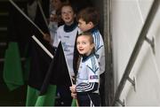 17 March 2018: AIB flagbearer Ebany Crotty, age 9, who won an AIB flag bearer competition to wave on Nemo Rangers at the AIB Senior Football Club Championship Final between Corofin and Nemo Rangers at Croke Park on St. Patrick's Day. For exclusive content and behind the scenes action of the AIB GAA & Camogie Club Championships follow AIB GAA on Facebook, Twitter, Instagram and Snapchat and www.aib.ie/gaa. Photo by David Fitzgerald/Sportsfile