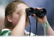 3 August 2003; A Fermanagh fan watches the match with binoculars. Bank of Ireland All-Ireland Senior Football Championship Quarter Final, Tyrone v Fermanagh, Croke Park, Dublin. Picture credit; Brendan Moran / SPORTSFILE *EDI*