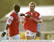7 August 2003; Tony Bird of St Patrick's Athletic, right, celebrates with team-mate Charles Mbabazi Livingston after scoring his sides first goal during Eircom League Premier Division match betweem St Patrick's Athletic and UCD at Richmond Park in Dublin. Photo by Damien Eagers/Sportsfile