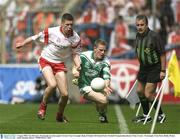3 August 2003; Tom Brewster of Fermanagh, in action against  Sean Cavanagh of Tyrone during the Bank of Ireland All-Ireland Senior Football Championship Quarter Final match between Tyrone and Fermanagh at Croke Park in Dublin.