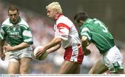 3 August 2003; Owen Mulligan of Tyrone, in action against Barry Owens, left, and Paul Brewster of Fermanagh during the Bank of Ireland All-Ireland Senior Football Championship Quarter Final match between Tyrone and Fermanagh at Croke Park in Dublin.
