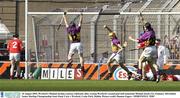 10 August 2003; Michael Jordan of Wexford, centre, celebrates after scoring his second goal with teammate Michael Jacob, left, during the Guinness All-Ireland Senior Hurling Championship Semi-Final match between Cork and Wexford at Croke Park in Dublin. Photo by Damien Eagers/Sportsfile