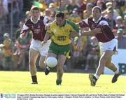 10 August 2003; Brendan Devenney of Donegal, in action against  Kieran Fitzgerald, left, and Kevin Walsh of Galway, during the Bank of Ireland All-Ireland Senior Football Championship Quarter-Final replay match between Galway and Donegal at McHale Park in Castlebar, Co Mayo. Photo by David Maher/Sportsfile