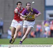 10 August 2003; Adrian Fenlon of Wexford in action agaist Sean Og O'hAilpin of Cork during the Guinness All-Ireland Senior Hurling Championship Semi-Final match between Cork and Wexford at Croke Park in Dublin. Photo by Damien Eagers/Sportsfile