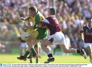 10 August 2003; Brian Roper of Donegal, in action against Kevin Brady of Galway, during the Bank of Ireland All-Ireland Senior Football Championship Quarter-Final replay match between Galway and Donegal at McHale Park in Castlebar, Co Mayo. Photo by David Maher/Sportsfile