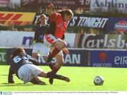 10 August 2003; Mary Purcell of Lifford in action against Rosie Power of UCD during FAI National Women's Cup final match between UCD and Lifford at Richmond Park in Dublin. Photo by Pat Murphy/Sportsfile