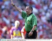 10 August 2003; Referee Aodan MacSuibhne during the Guinness All-Ireland Senior Hurling Championship Semi-Final match between Cork and Wexford at Croke Park in Dublin. Photo by Damien Eagers/Sportsfile