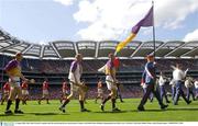10 August 2003; Wexford's captain Paul Codd leads his team during the pre-match parade before the Guinness All-Ireland Senior Hurling Championship Semi-Final match between Cork and Wexford at Croke Park in Dublin. Photo by Damien Eagers/Sportsfile