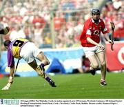 10 August 2003; Pat Mulcahy of Cork, in action against Larry O'Gorman of Wexford during the Guinness All-Ireland Senior Hurling Championship Semi-Final match between Cork and Wexford at Croke Park in Dublin. Photo by Damien Eagers/Sportsfile