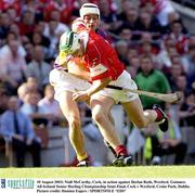 10 August 2003; Niall McCarthy of Cork, in action against Declan Ruth of Wexford during the Guinness All-Ireland Senior Hurling Championship Semi-Final match between Cork and Wexford at Croke Park in Dublin. Photo by Damien Eagers/Sportsfile
