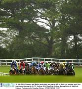 28 July 2003; Runners and Riders make their way up the hill on their way past the post, first time round, during the G.P.T. Galway Q.R. Handicap during the Galway Racing Festival at Ballybrit Racecourse in Galway. Photo by Brendan Moran/Sportsfile