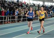 18 March 2018; Claire Caulfield from Waterford AC, left, passes Ava Ross from Glaslough Harriers, Co Monaghan, on her way to winning the Girls U16 1.5k Walk event, at the Irish Life Health National Juvenile Indoor Championships day 2 at Athlone IT in Athlone, Co Westmeath. Photo by Tomás Greally/Sportsfile