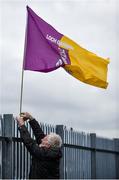24 March 2018; Tom Boland, from Killinick, Co Wexford, puts up a Wexford flag ahead of the Allianz Hurling League Division 1 quarter-final match between Wexford and Galway at Innovate Wexford Park in Wexford. Photo by Sam Barnes/Sportsfile