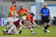 24 March 2018; Alan Devine of Westmeath in action against Carlow's, from left, Alan Corcoran, Richard Coady and Paul Coady during the Allianz Hurling League Division 2A Final match between Westmeath and Carlow at O'Moore Park in Portlaoise, Laois. Photo by Piaras Ó Mídheach/Sportsfile